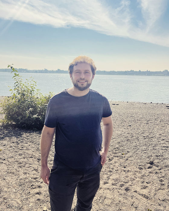 Hi, I'm Max and here's a photo of me taken in 2022 on the Vancouver Waterfront park!